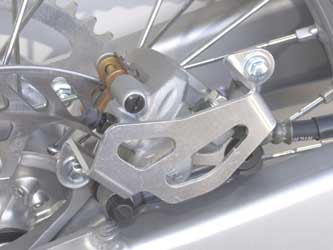 Main image of Works Connection Rear Caliper Guard KX/KXF 04-17